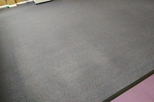 Finished cleaned grey carpet